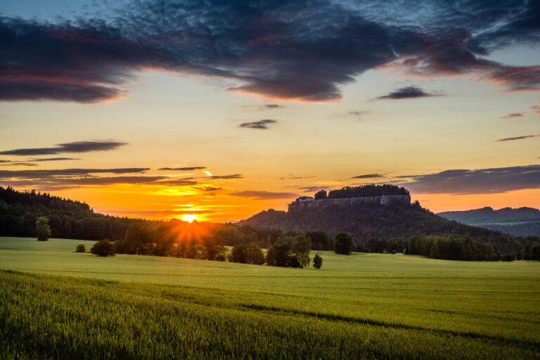 sunset over the koenigstein fortress in saxon switzerland, germa